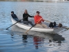 A family enjoys the undecked version of our Jersey Skiff