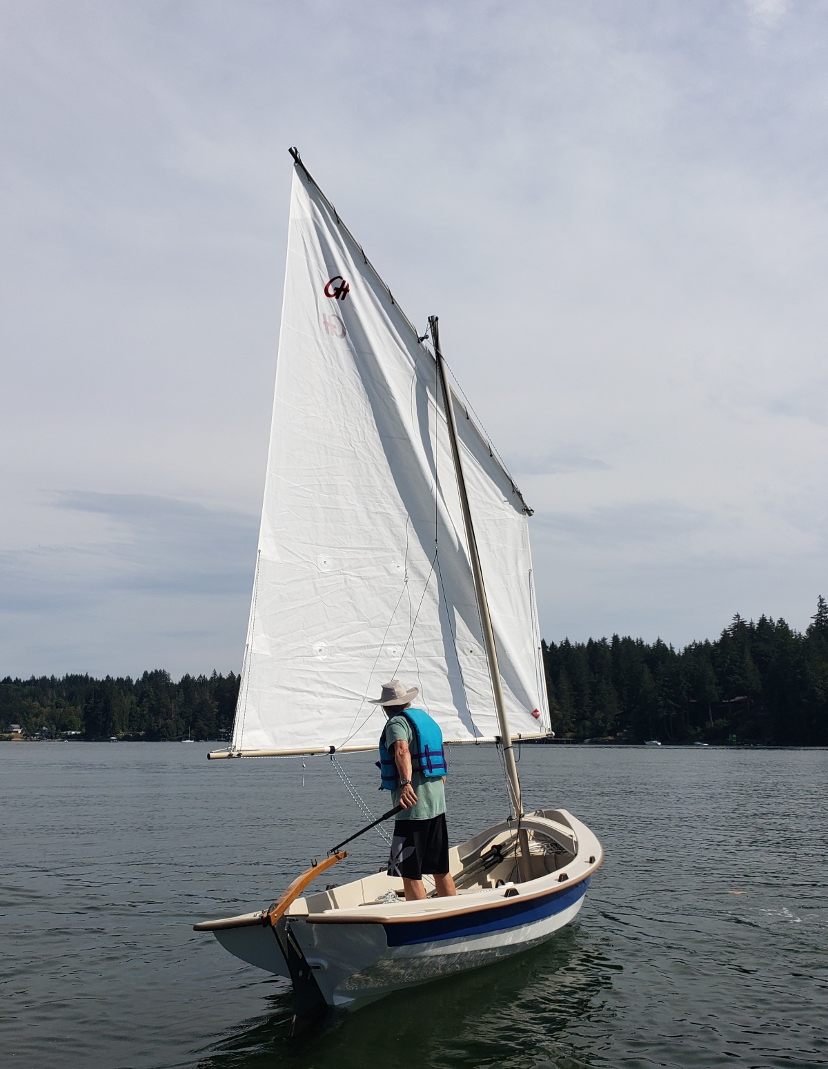 Rear quarter view of the Salish Voyager under sail