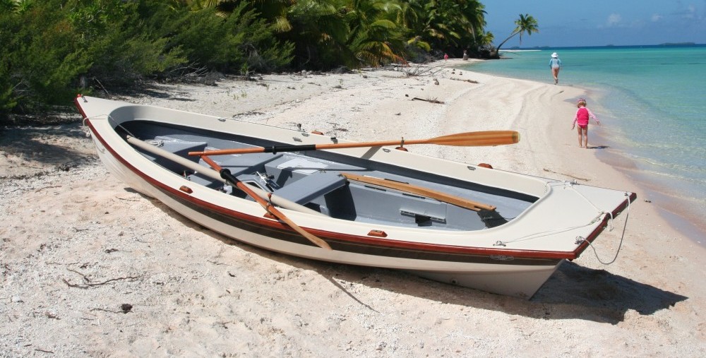 A Jersey Skiff sunning on the beach in the Marquesas