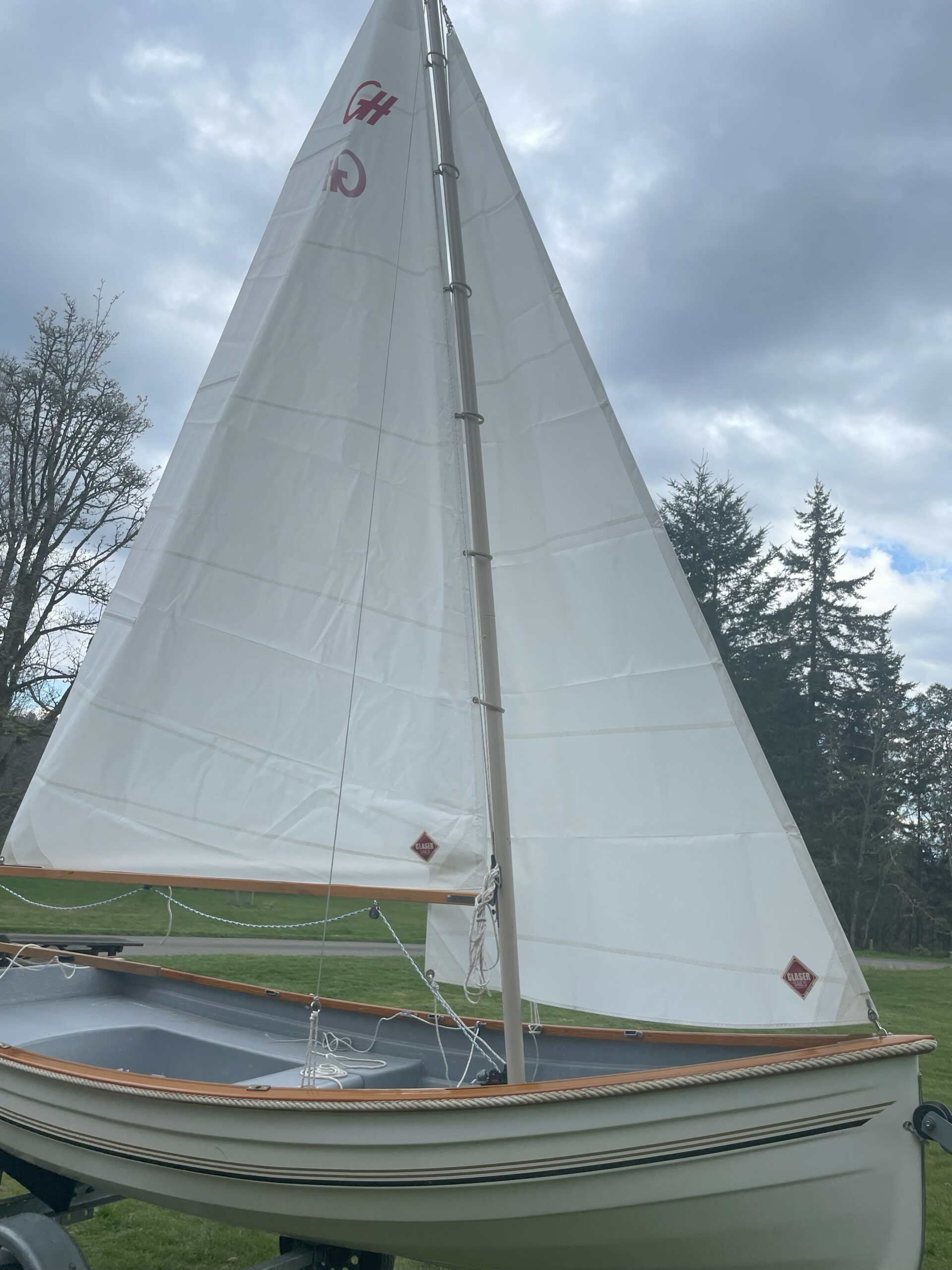 Side View Of A Wooden Vintage Boat In A Harbor Photo Picture And