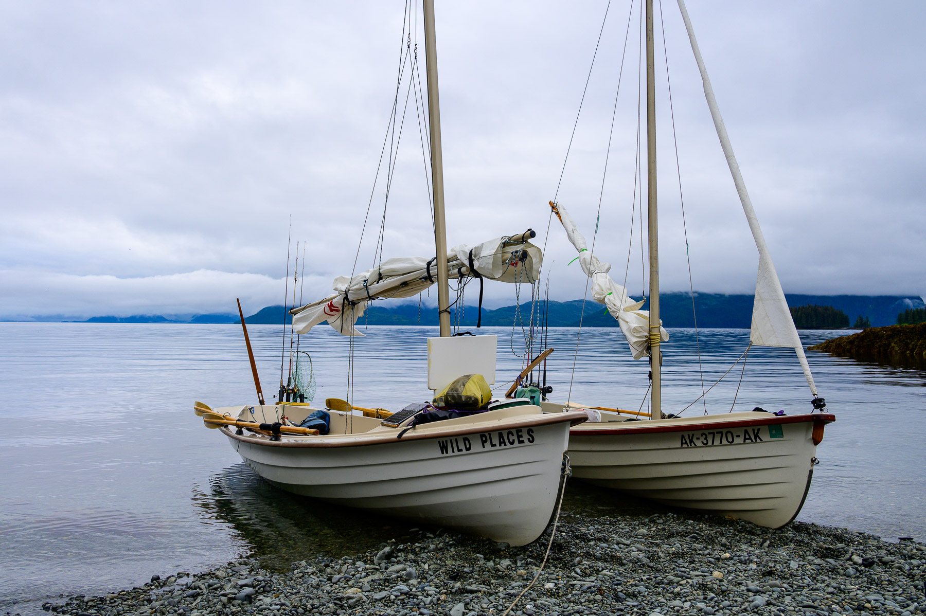 Salish Voyager and Jersey Skiff side by side on a beach in Prince William Sound